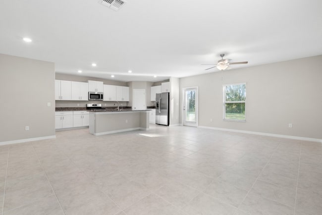 Photo - "Spacious 5-Bedroom Retreat in Apollo Beach - Modern Living with 2.5 Baths on White Chicory Dr!"