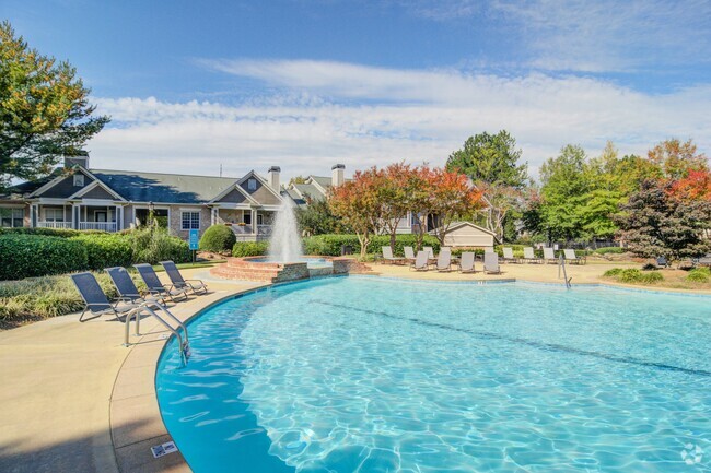 Expansive Pool Area - The Residences on McGinnis Ferry Apartments