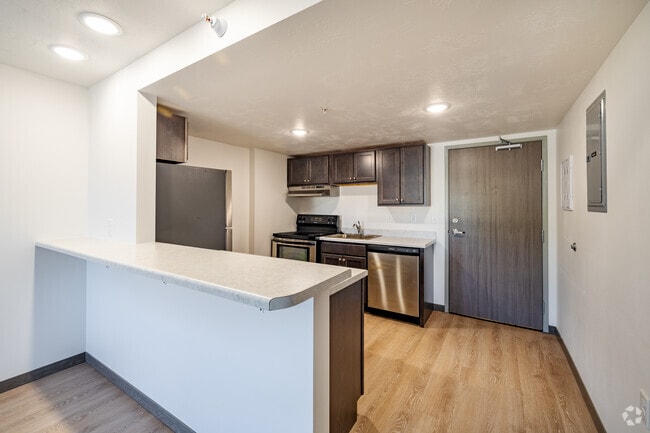 1BR, 1BA - 1,000SF - Kitchen and Dining Area