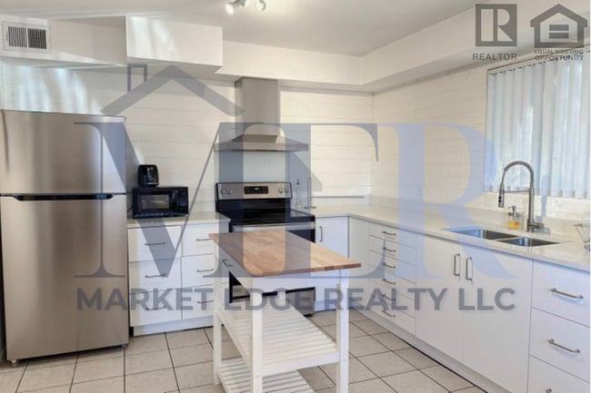 Building Photo - 4711 Unit 4711#3-1