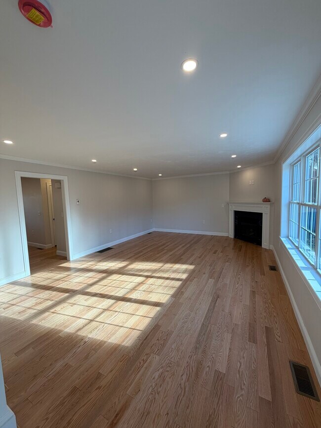 Living room with gas fireplace - 507 Mendon Rd
