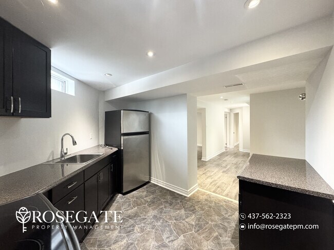 Photo - Bright 2-Bedroom Basement Apartment with P... Unit 2