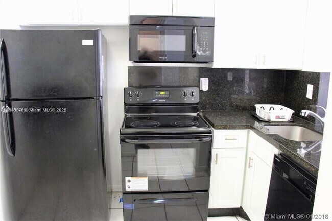 Photo - 486 NW 165th St Unidad 404