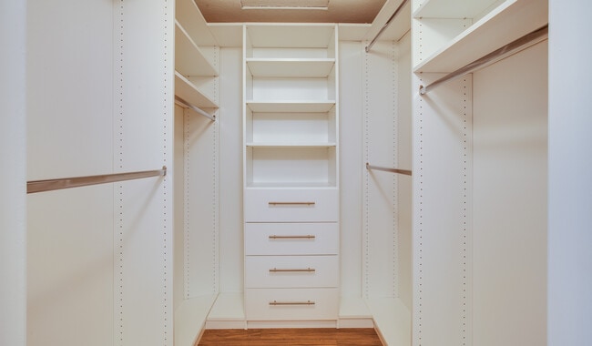Walk-in closets offer great hanging space with extra organization component