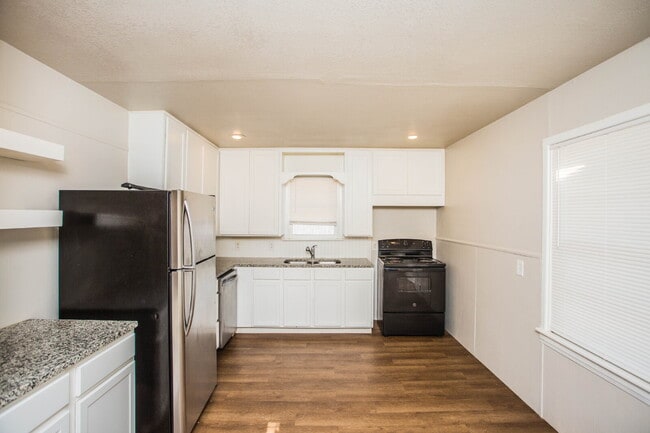 Photo - "Charming 4-Bedroom Home with Granite Touches & Gleaming Hardwood Floors in Lubbock!"