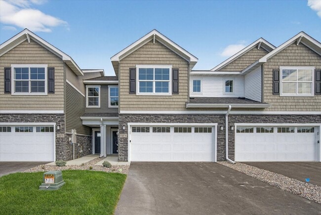 Building Photo - Westview townhome plan in Corcoran’s Hope Meadows community—a brand-new townhome development near...