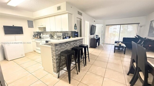 Building Photo - 9645 NW 1st Ct Unit 1-103