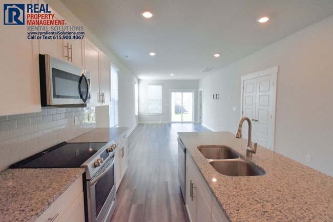Photo - Beautiful 3 bedroom+loft townhome with an attached garage! Triple Blackman schools