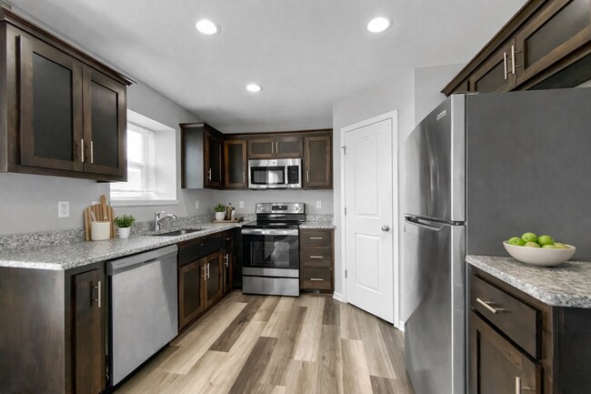 Photo - 4BR/3BA Home for Rent in Peculiar, MO 64078 | 2-Car Garage | Deck | Pet-Friendly | Cass County