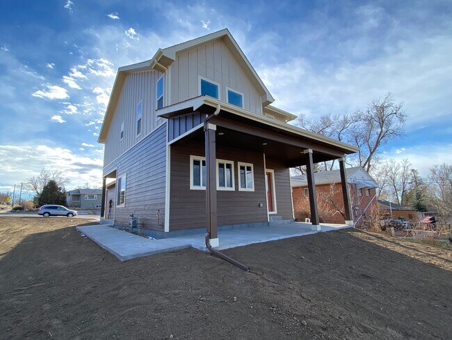Back and Side of House (Fence and landscaping coming soon) - 1130 Swope Ave House