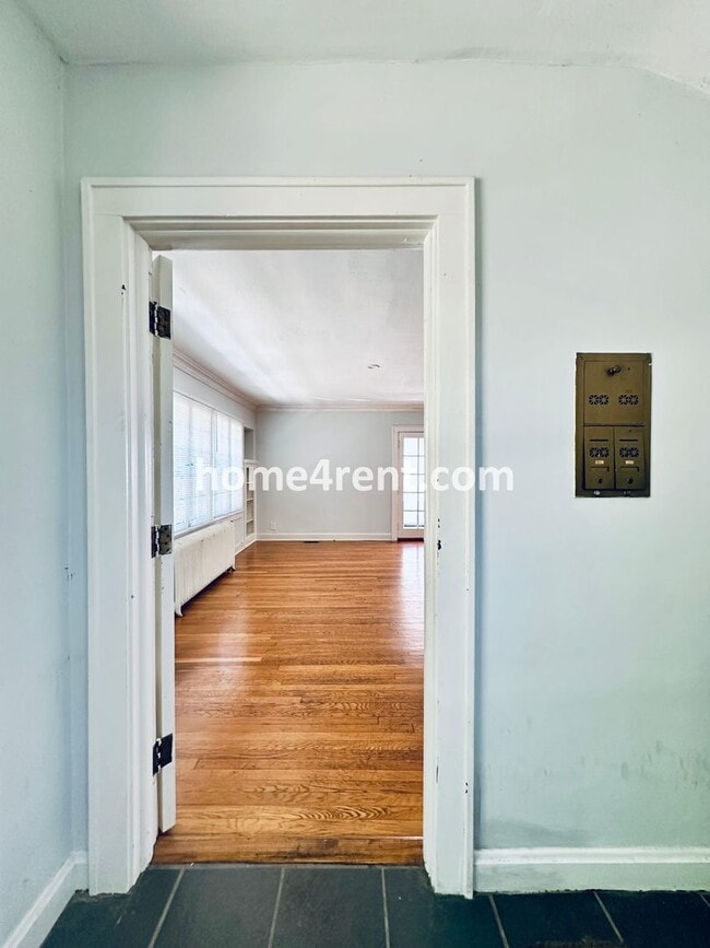 Photo - First Level Condo, Just Off the Plaza with Hardwood Floors and Lawn Care Provided!
