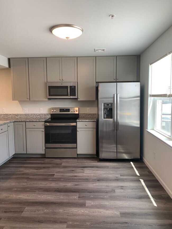 Photo - Spacious 3-Bedroom End-Unit Townhouse – Ap...