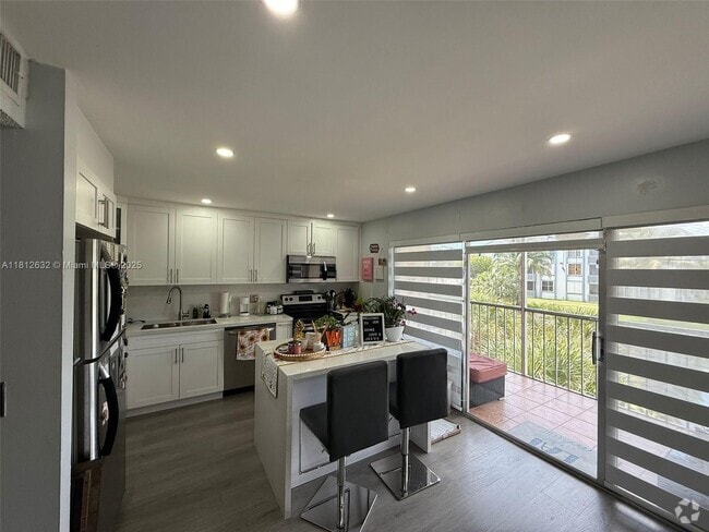 Building Photo - 17000 NW 67th Ave Unit 233 Rental