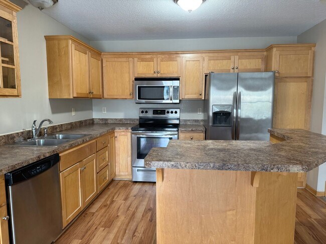 Photo - Spacious 3BR / 3BA Townhome with 2-Car Garage – Available Mid-March!