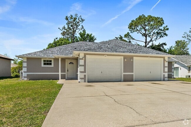 Building Photo - Spacious 3 Bedroom 2 Bath 1 Car Duplex in ... Rental
