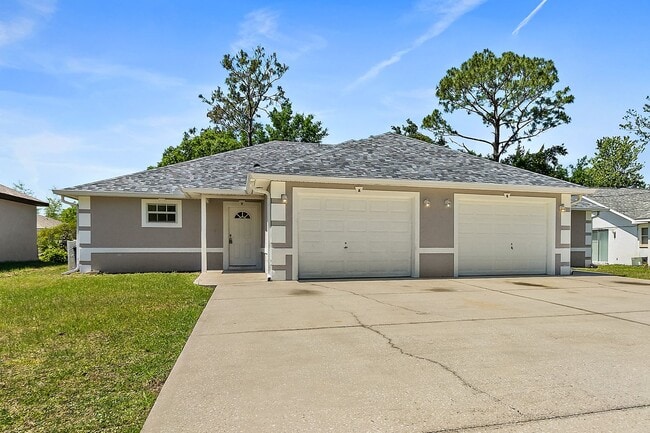 Building Photo - Spacious 3 Bedroom 2 Bath 1 Car Duplex in ... Rental