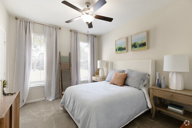 2BR, 2BA - 953SF - Primary Bedroom - Villas of Spring Creek