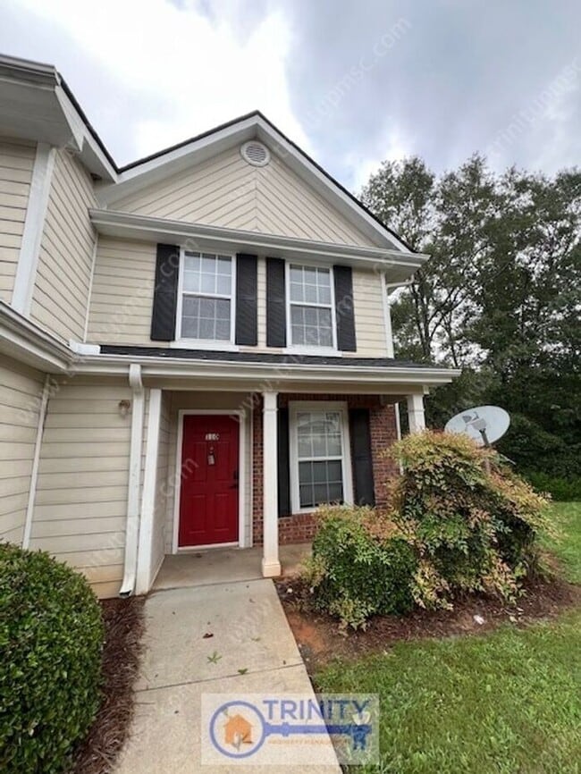 Building Photo - Cute TWO STORY Town Home!