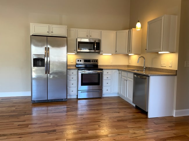 Building Photo - Downtown Morganton - One Bedroom Apt on top floor with wood floors great natural light, updated f... Unit A301