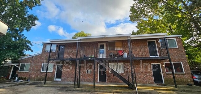 Building Photo - 5537 Iowa Ave Unit E