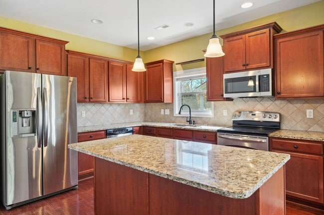 Photo - Welcome to this charming 4-bedroom, 2.5-bathroom home located in Durham, NC.!