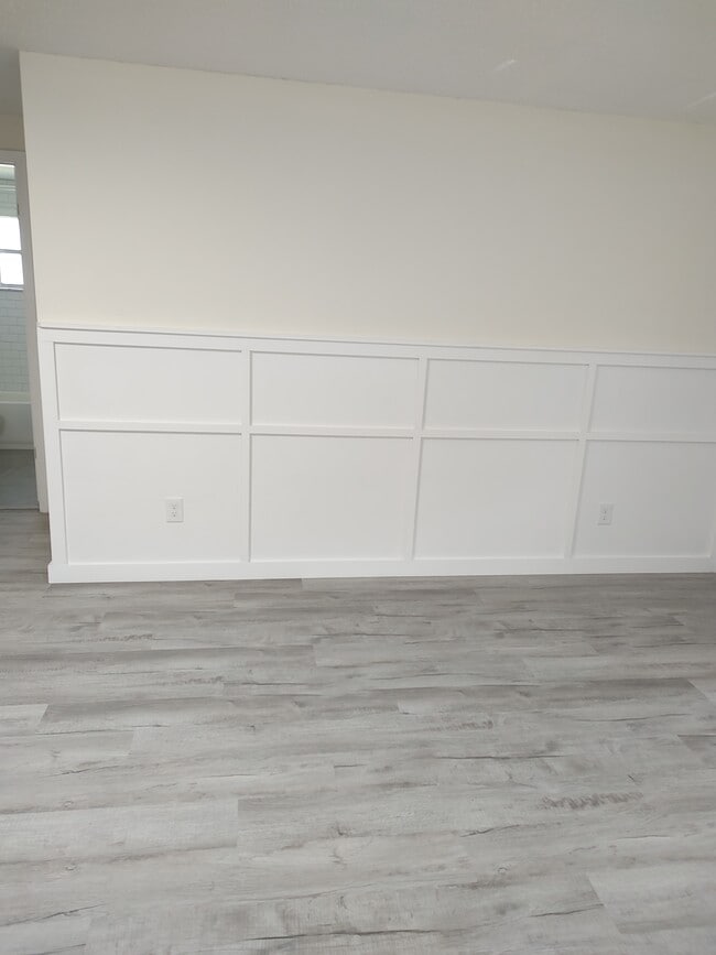 New accent wall in living room - 5931 13th St Unit Front