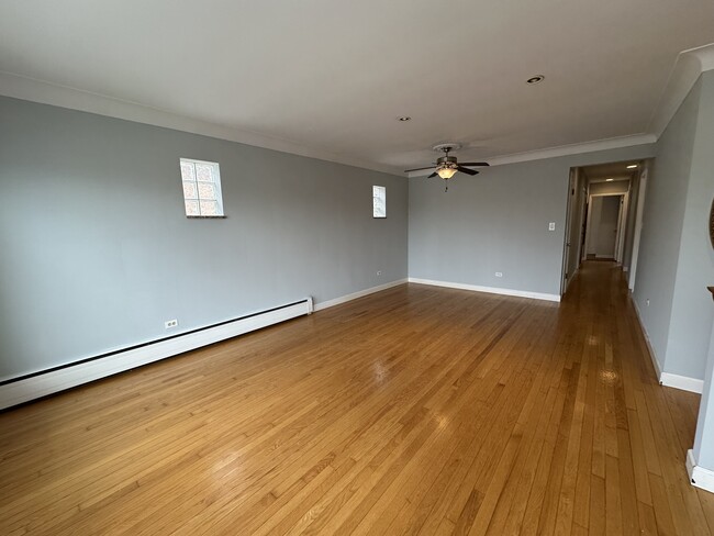 Living Room - 5754 W Montrose Ave Apartments