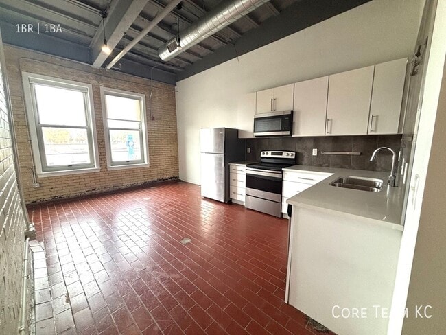 Building Photo - 1180 E 30th St Unit 238