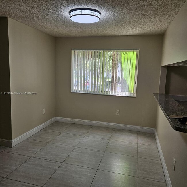 Photo - 741 N Pine Island Rd Unit 212