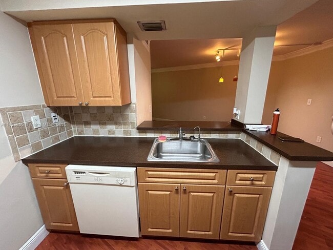 Building Photo - 7165 NW 186th St Unit A204 Rental