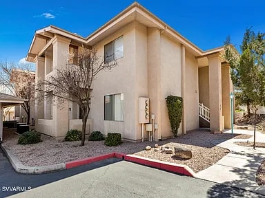 Parking lot angle - 985 E Mingus Ave Unit Casa Del Sol South