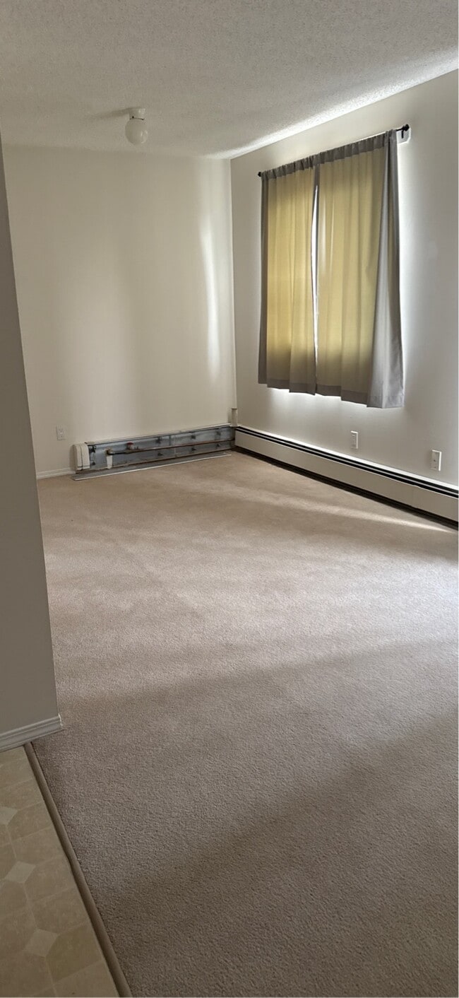 Photo - 4917-4961 61 Ave Unit CS-304