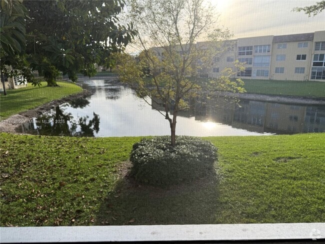 Building Photo - 6051 NW 61st Ave Unit 210 Rental