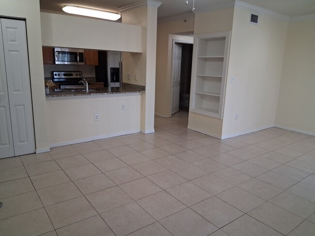 Building Photo - 6482 Emerald Dunes Dr Unit 202