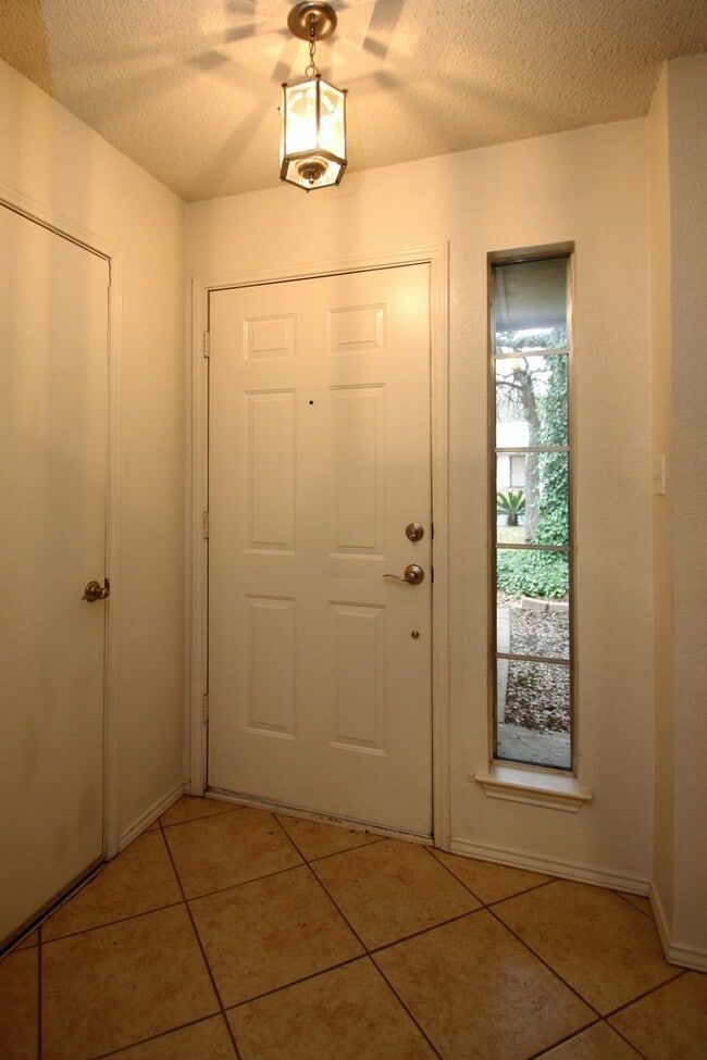 Photo - Great 1 story home on a pretty lot with lots of trees!