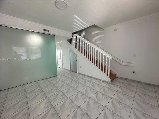 Building Photo - 9837 W Okeechobee Rd Rental