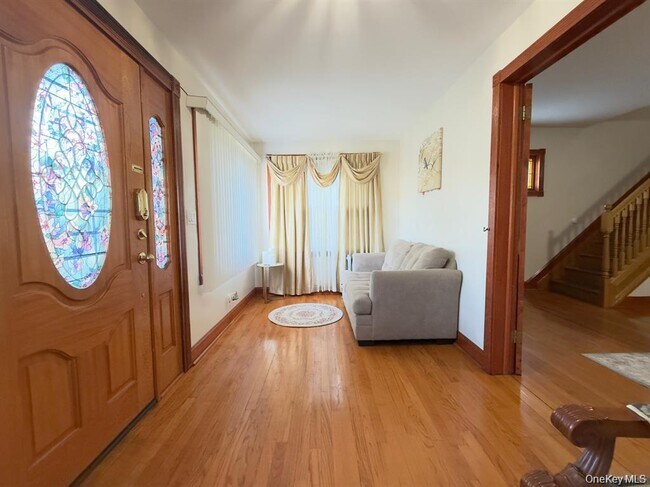 209-44 110th Ave