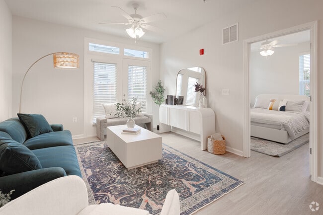 2BR, 2BA - 911SF - Living Room - Joyfield Flats at Woodbridge