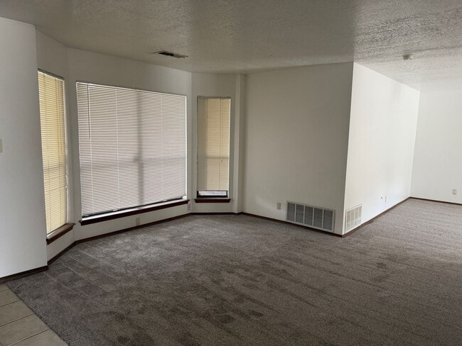 Photo - 4 Br, 1.75 Ba, 2 living areas, formal dining room, 2 CG, nice yards, storage shed