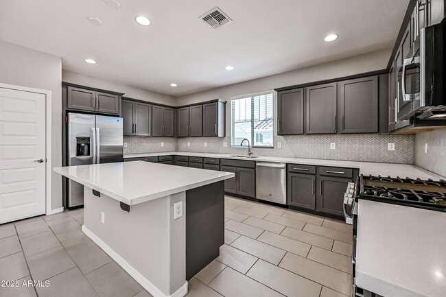 Building Photo - 3817 N 100th Dr Rental