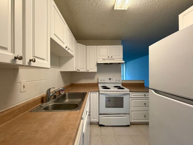 Building Photo - Mililani - 2 Bed, 1 Bath Condo w/ 2 Parking, Pets OK! Unit C304