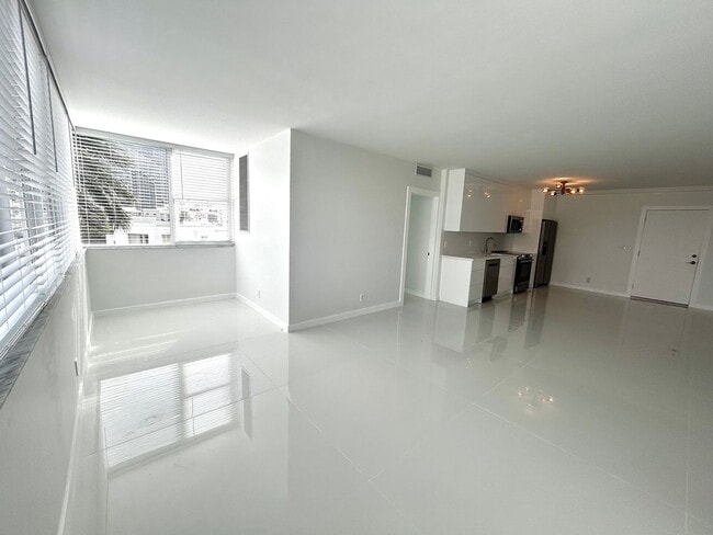 Photo - Fully Renovated East-Facing 2BR/2BA + Bonus Room | Ocean Views | In-Unit W/D Unit 401