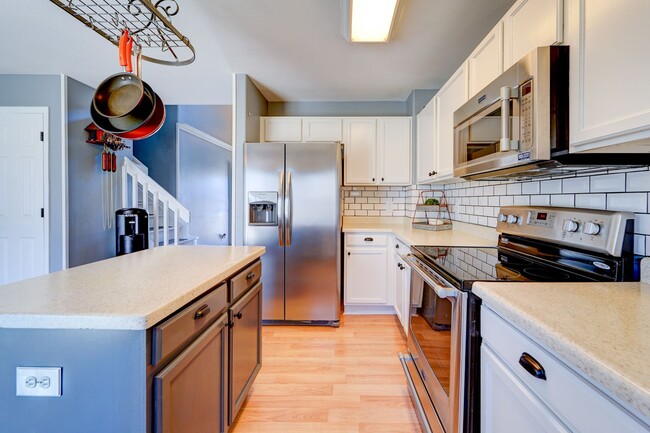 Photo - Evolve Real Estate: Available 06/03/2026 Beautiful 3 Bedroom + Loft + Finished Basement in the Po...