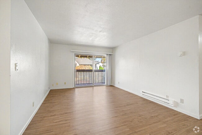 2BR, 1BA - 850SF - Living Room - Emerald Bay Apartments