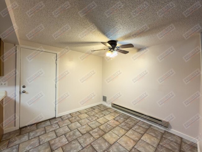 Photo - Single family home with a garage