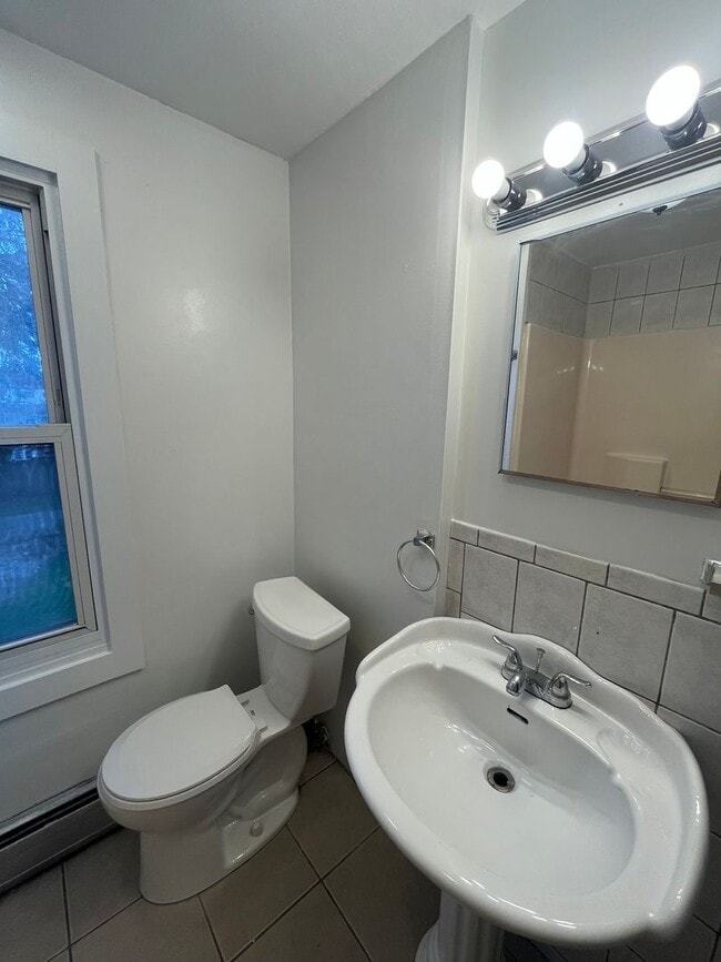 Photo - 3-Bed Home w/ Driveway & Enclosed Porches – Convenient Rochester Location