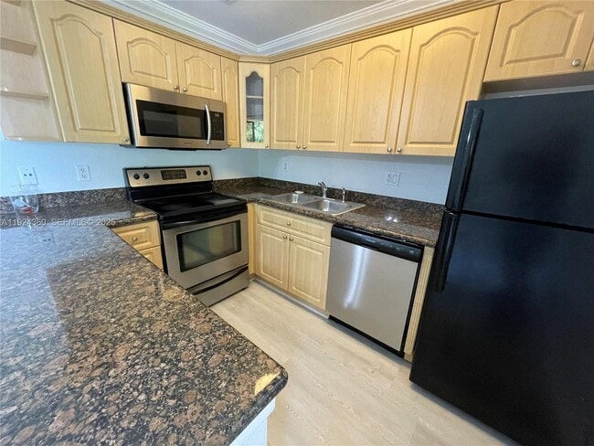 Building Photo - 1401 NE 53rd St Unit 211