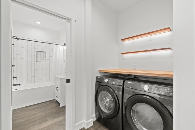 Photo - Brand new 2 bed/2 bath, central a/c, dishwasher, washer & dryer, deck & patio!