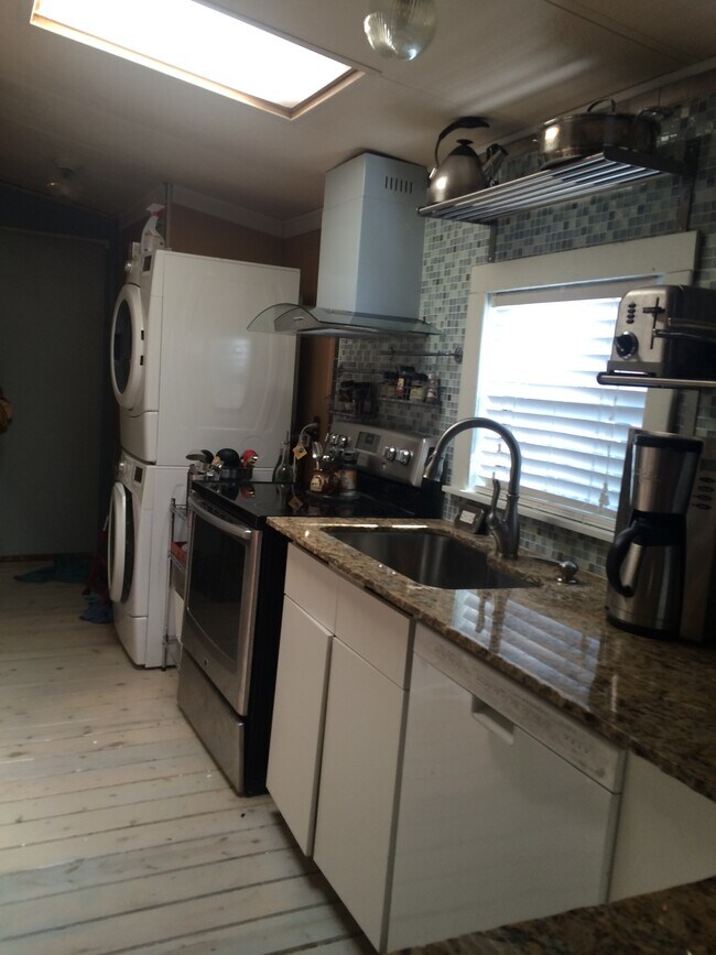 Home is renovated and upgraded. Appliances include full sized washer and dryer.
