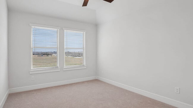Carpeted Bedroom - The Louise Townhomes